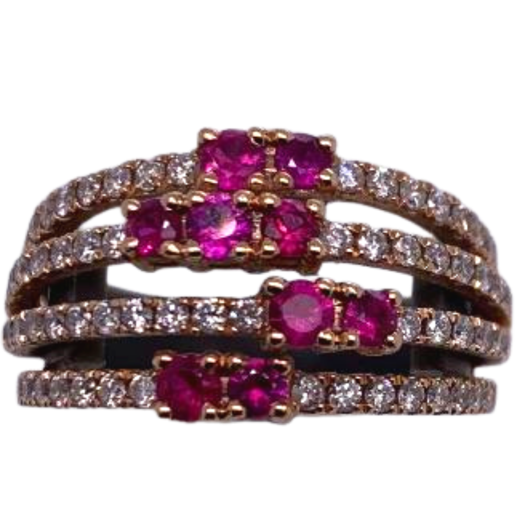 Fourteen Karat rose gold ring with rubies and diamond ring